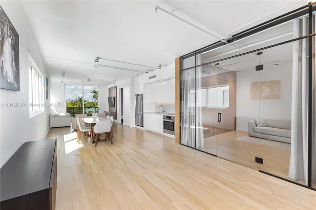 a living room with furniture and a table