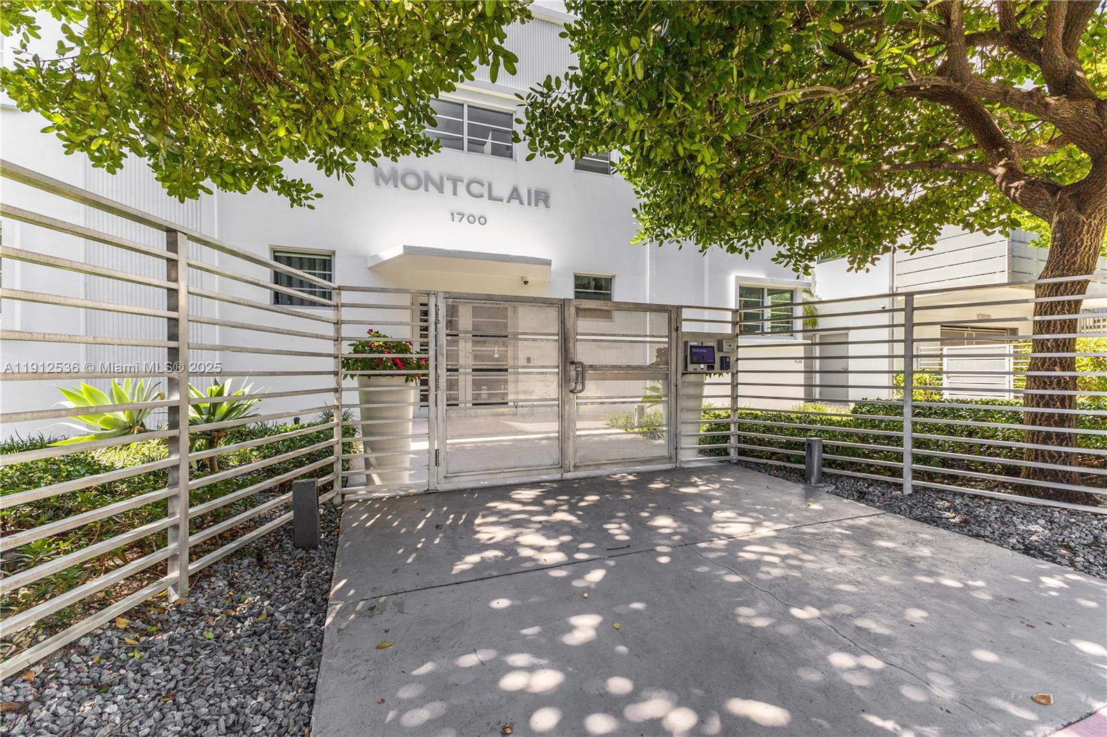 1700 Meridian Avenue, Unit 406 Miami Beach, FL 33139 - Photo 28 of 39 a view of a pathway with a street
