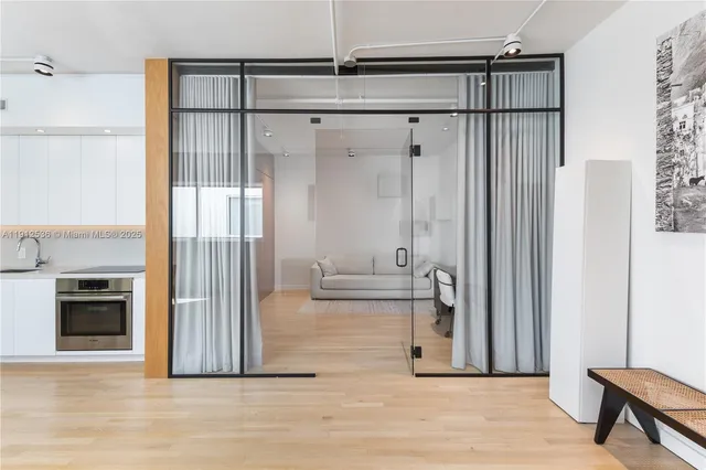 a view of a bathroom with a tub and shower