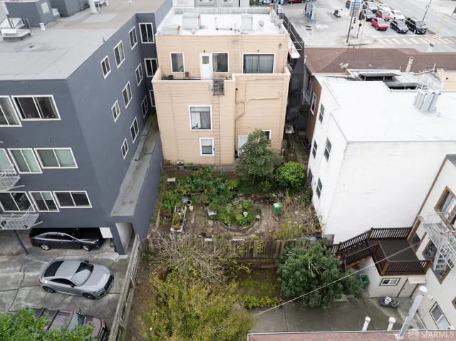 a view of a building with sitting area