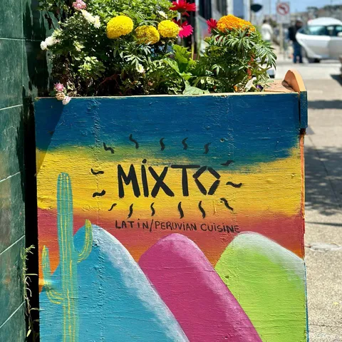 a view of a building with a street