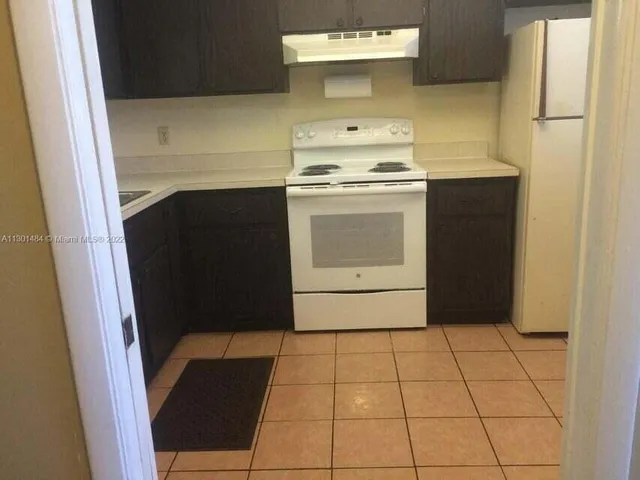 a view of a utility room with washer and dryer
