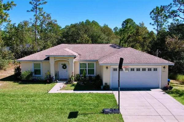 a house view with a garden space