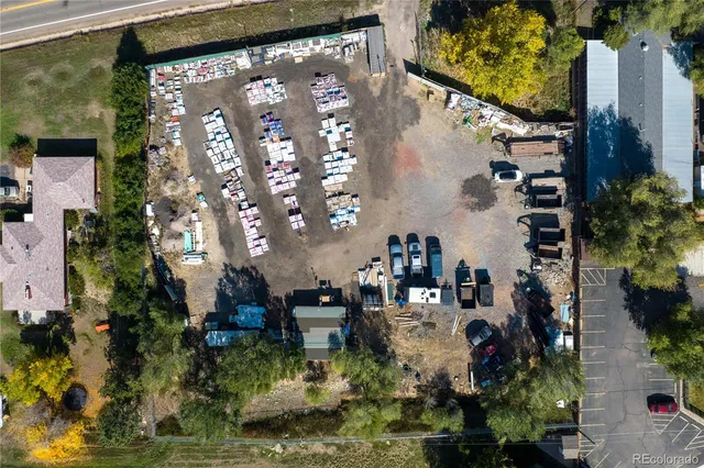 a view of outside house with a tree