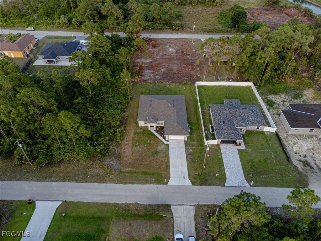 2914 Flora Avenue North Lehigh Acres, FL 33971 - Photo 31 of 39 an aerial view of a house