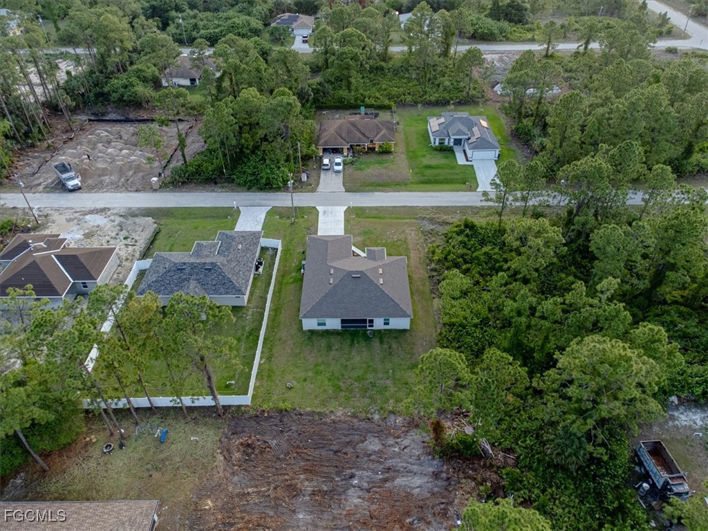 2914 Flora Avenue North Lehigh Acres, FL 33971 - Photo 38 of 39 an aerial view of a house