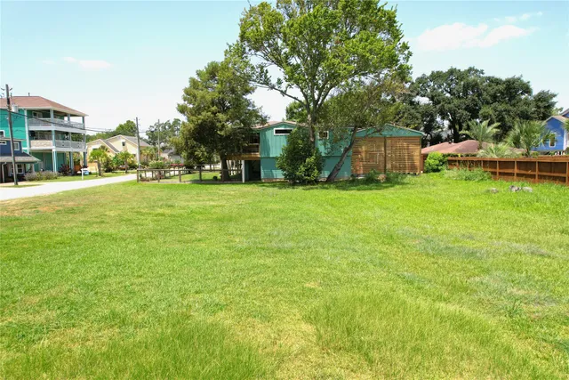a backyard of a house with a garden and entertaining space