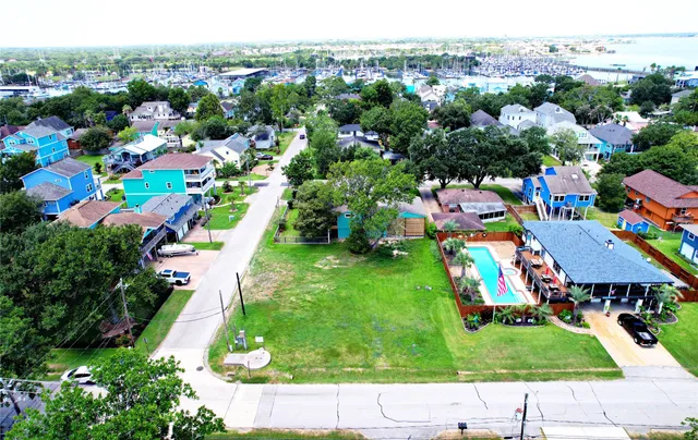 a picture of a table and chairs in backyard