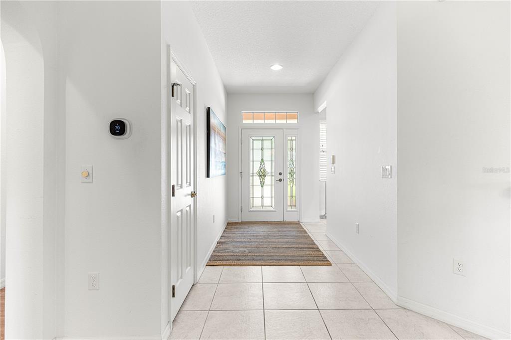 9317 Southwest 94th Loop Ocala, FL 34481 - Photo 4 of 40 a view of a hallway