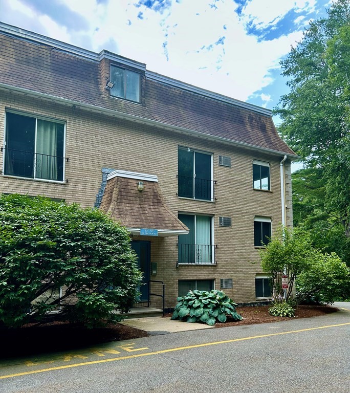 196 Swanson Road, Unit 510 Boxborough, MA 01719 - Photo 8 of 20 a front view of a house with a yard