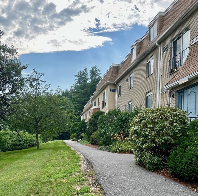 196 Swanson Road, Unit 510 Boxborough, MA 01719 - Photo 10 of 20 a front view of a house with a yard