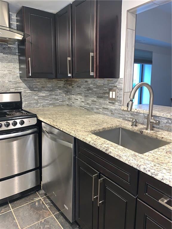 5708 Walnut Street, Unit G1 Pittsburgh, PA 15232 - Photo 5 of 19 Granite countertops, great prep workspace and open view into living room