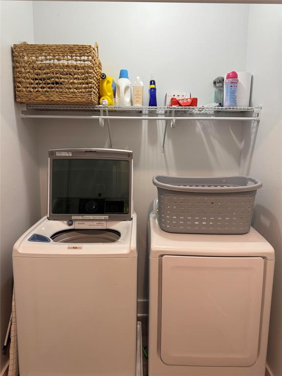 105 Pentecost Way Fort Walton Beach, FL 32547 - Photo 13 of 17 a utility room with dryer and washer