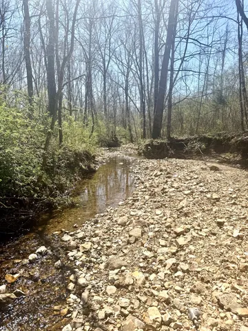 a very nice looking kitchen with a large window