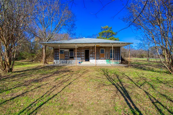 a view of a house with a swimming pool