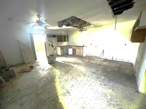 a view of a living room and a garage