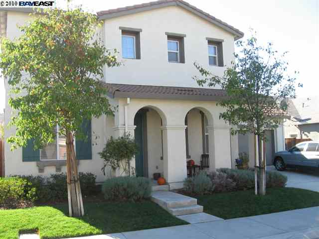 3220 Lookout Point Loop Discovery Bay, CA 94505 - Photo 1 of 1 a front view of a house with garden