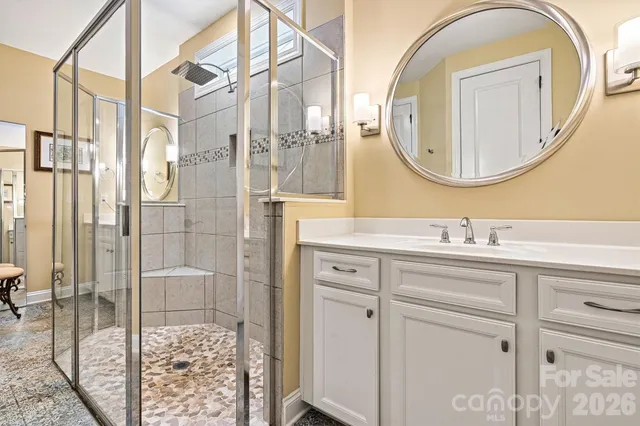 an aerial view of a house with yard swimming pool and outdoor seating