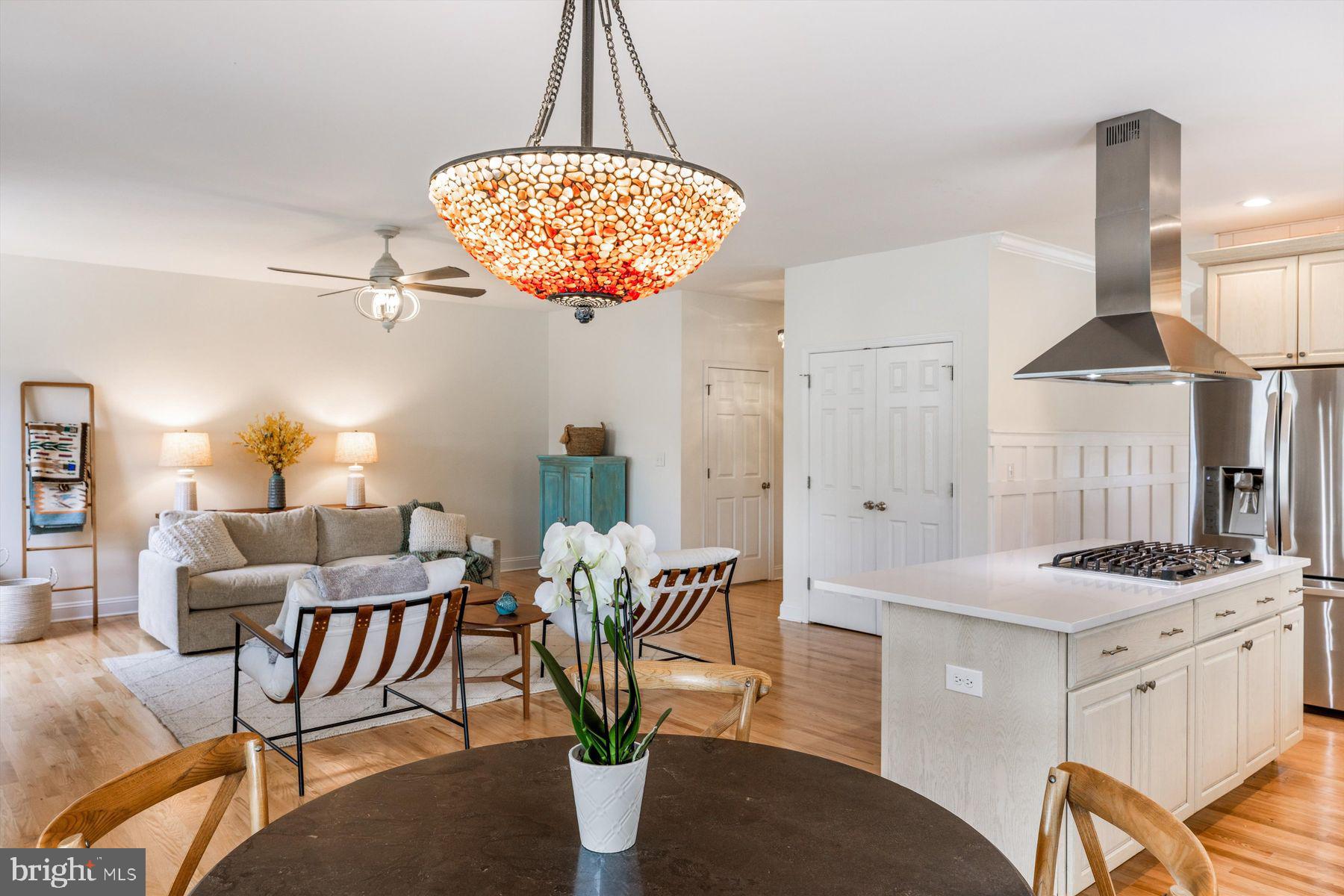 30 Reading Avenue Yardley, PA 19067 - Photo 16 of 39 a dining room with furniture a chandelier and wooden floor