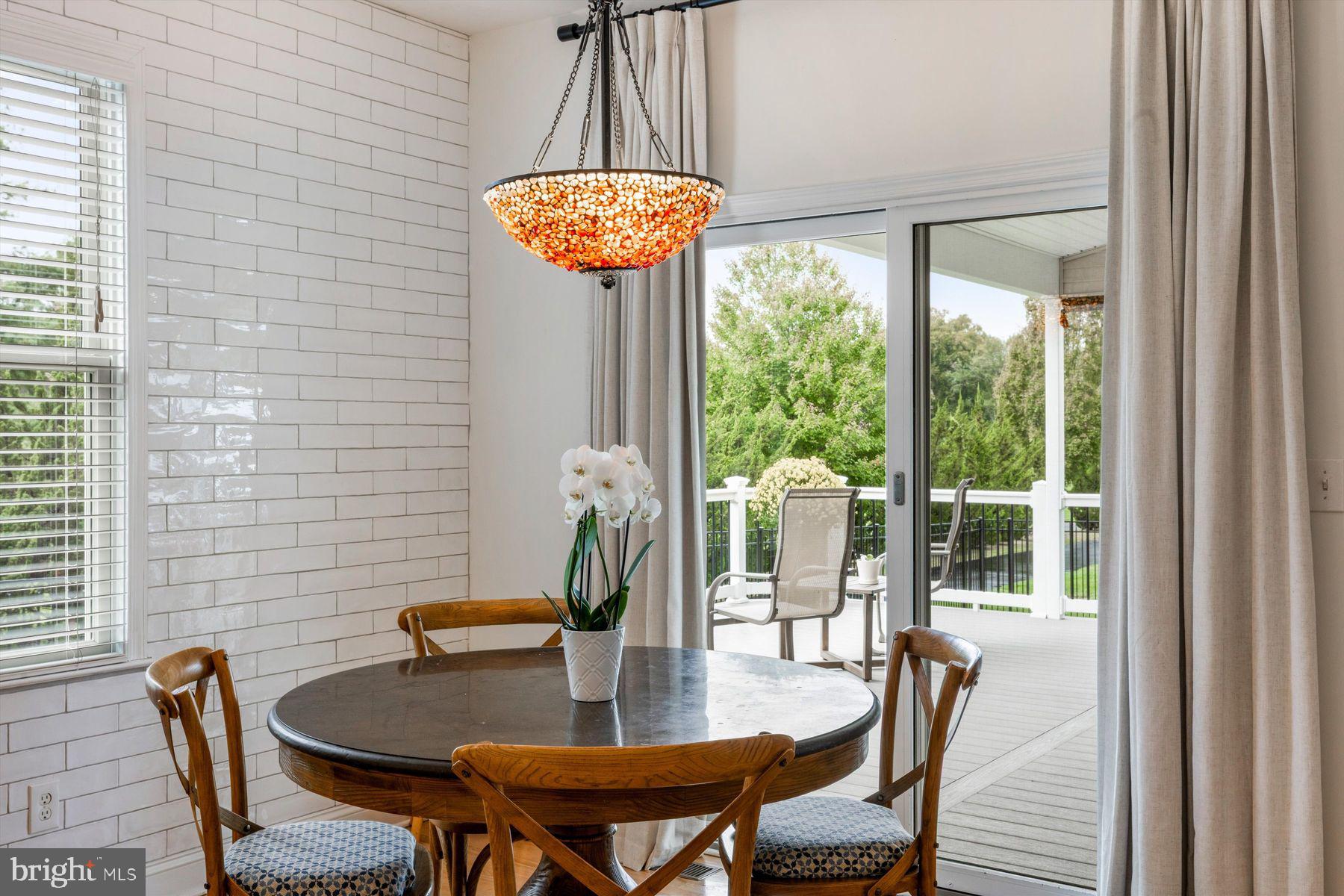 30 Reading Avenue Yardley, PA 19067 - Photo 17 of 39 a view of a dining room with furniture wooden floor and chandelier