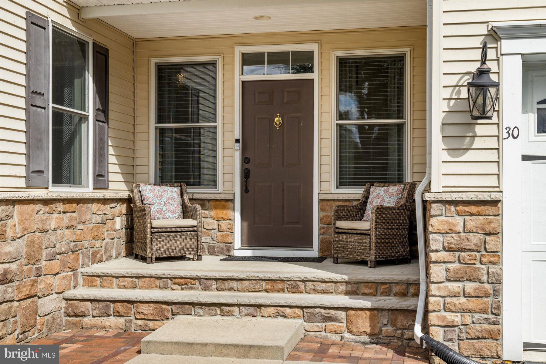 30 Reading Avenue Yardley, PA 19067 - Photo 2 of 39 a building exterior with furniture