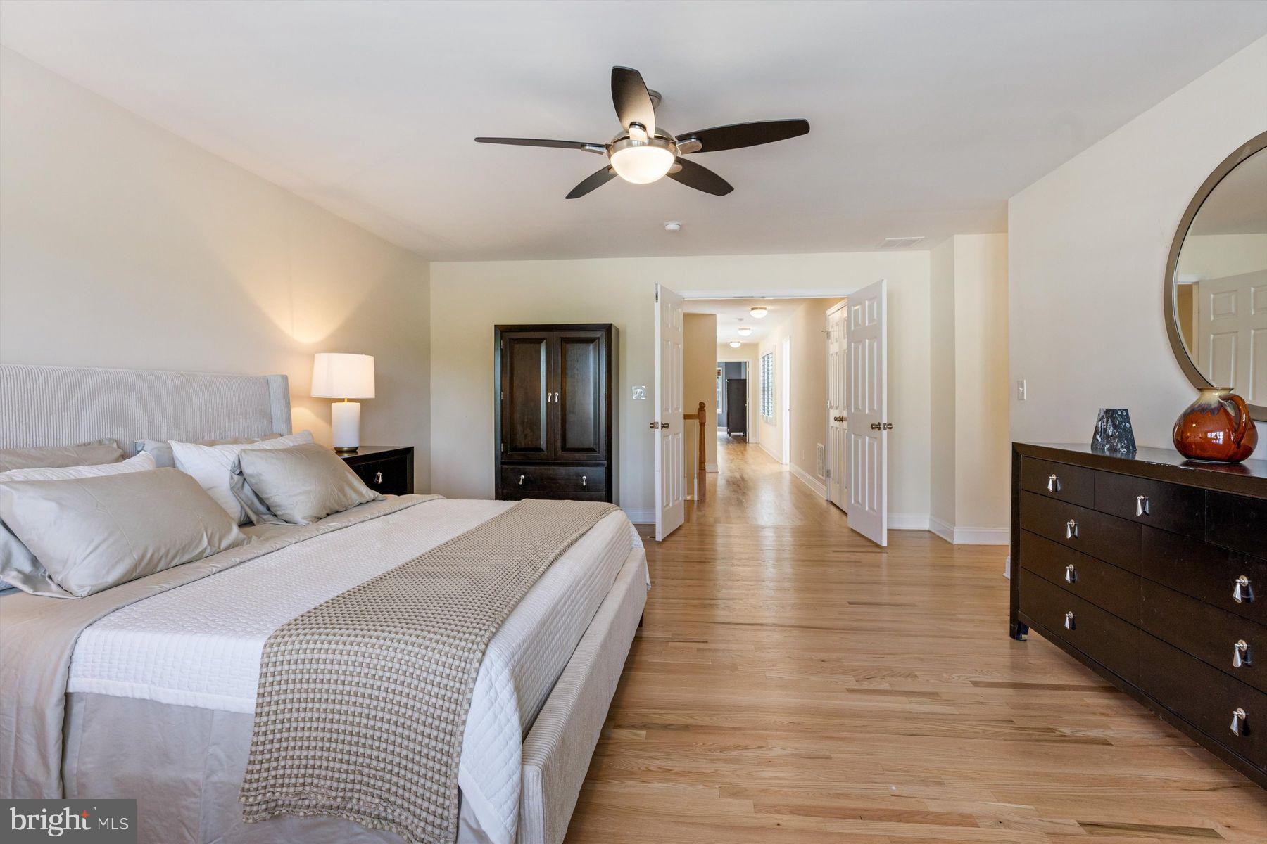30 Reading Avenue Yardley, PA 19067 - Photo 27 of 39 a bed room with a bed and a mirror on a dresser