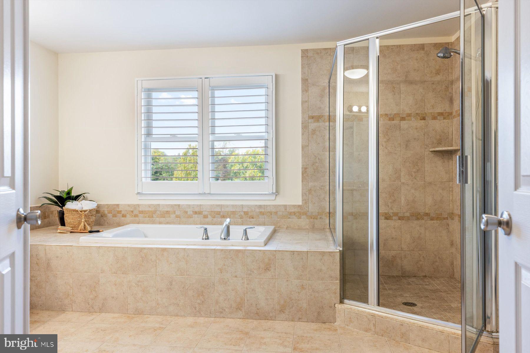 30 Reading Avenue Yardley, PA 19067 - Photo 29 of 39 a bathroom with a bathtub and a shower