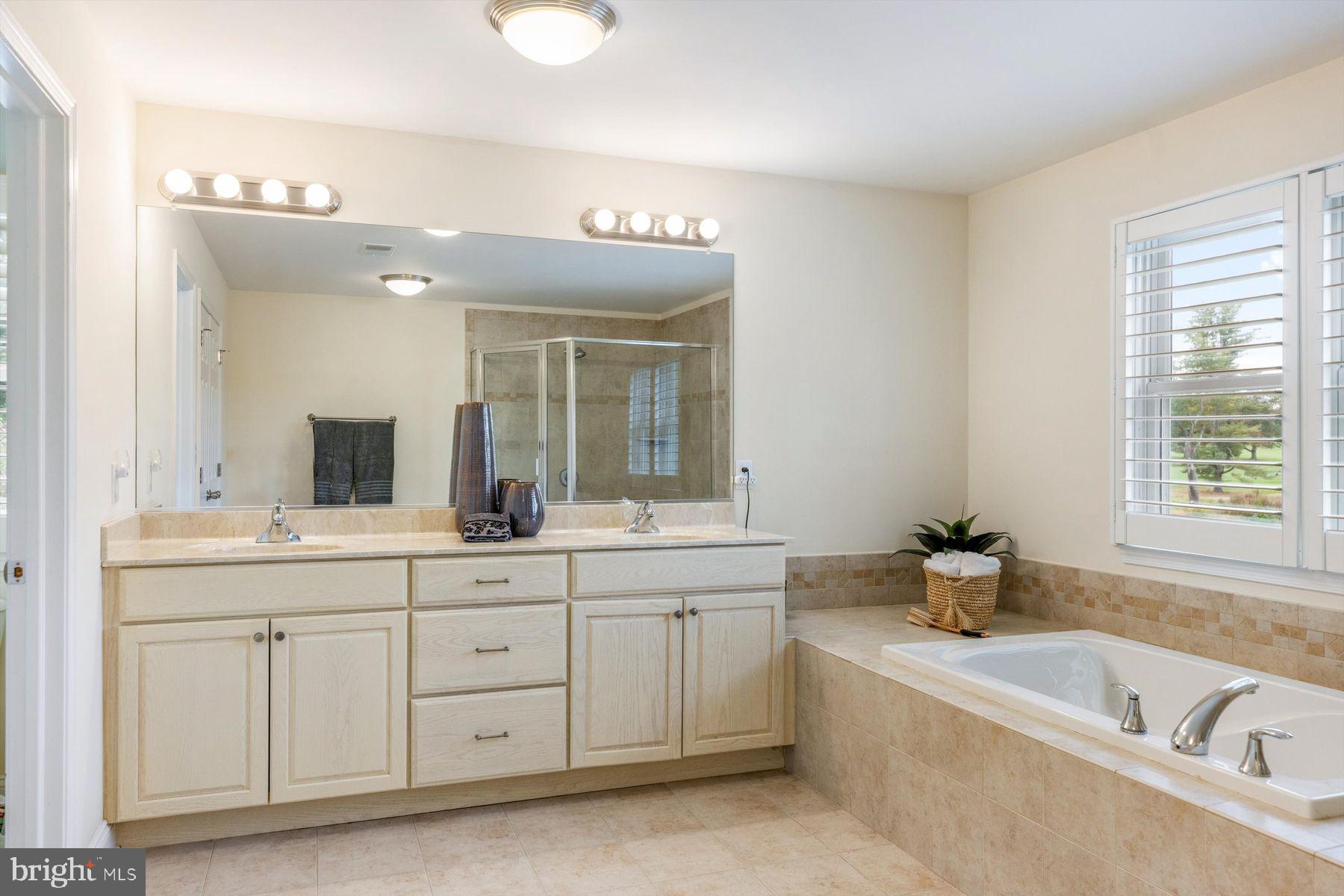 30 Reading Avenue Yardley, PA 19067 - Photo 30 of 39 a bath room with a sink and a large mirror