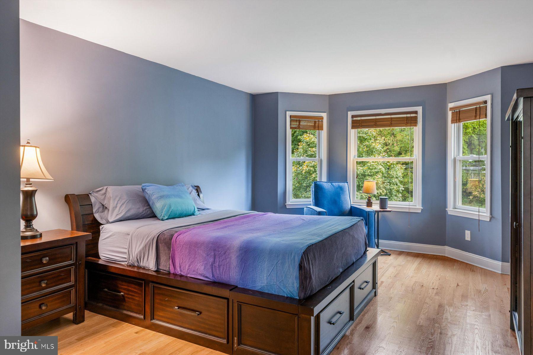 30 Reading Avenue Yardley, PA 19067 - Photo 33 of 39 a bedroom with a bed and a dresser next to a window