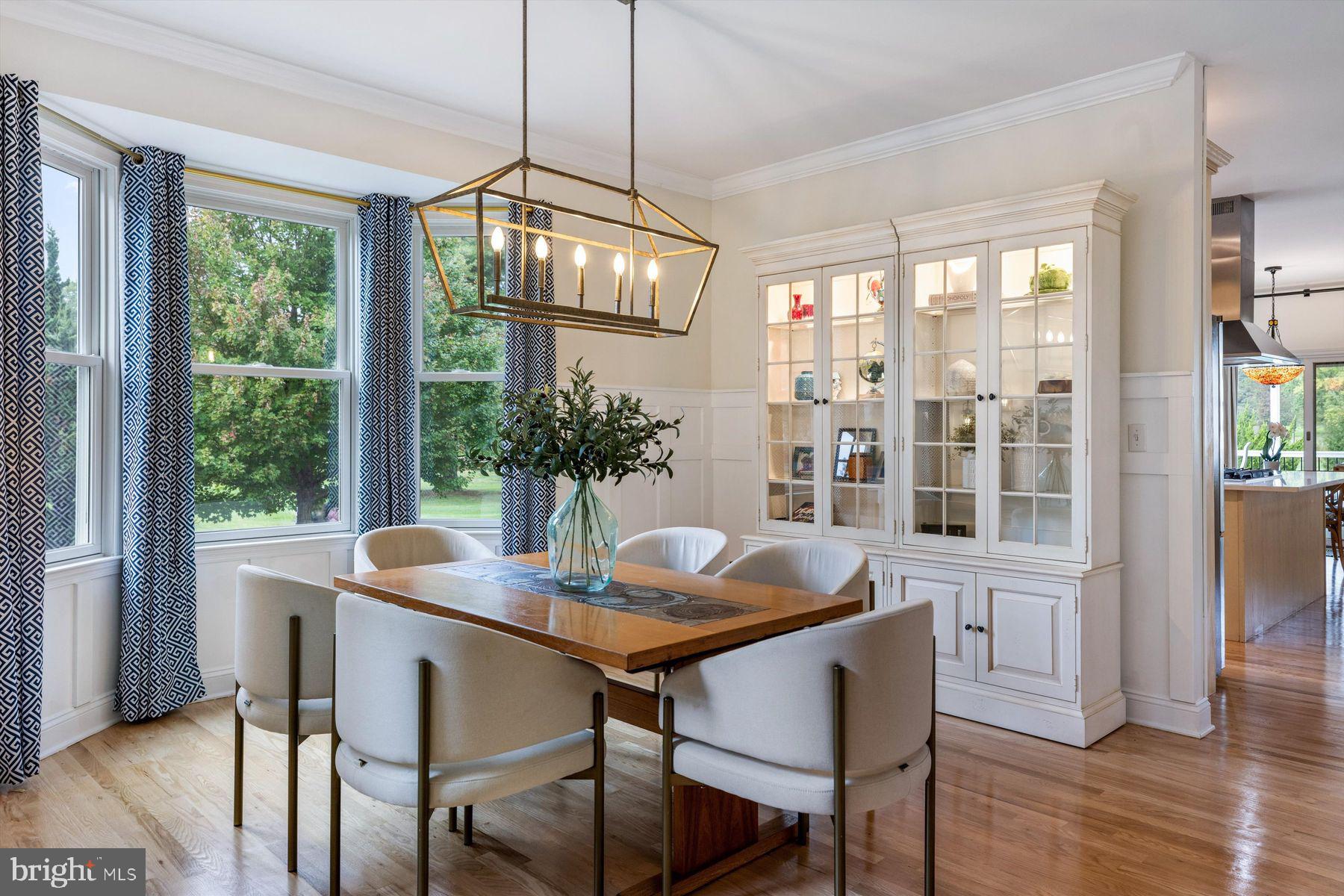 30 Reading Avenue Yardley, PA 19067 - Photo 6 of 39 a dining room with furniture a chandelier and wooden floor