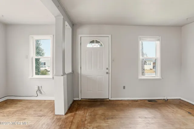 an empty room with window