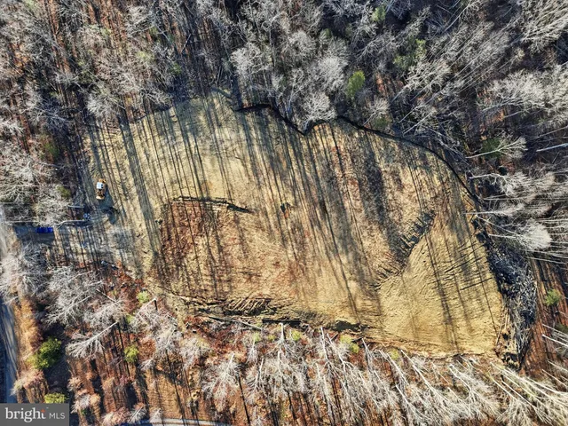 a view of swimming pool from a balcony