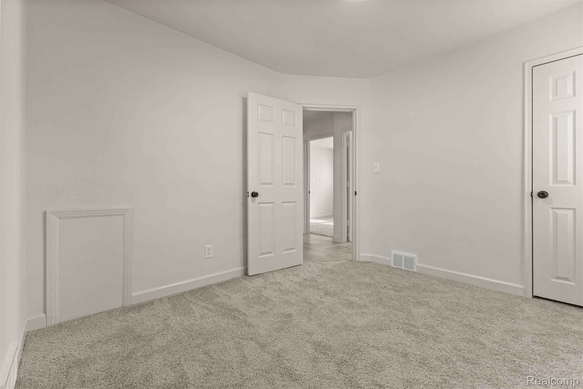 19320 Telegraph Road Detroit, MI 48219 - Photo 18 of 27 Carpeted empty room with baseboards