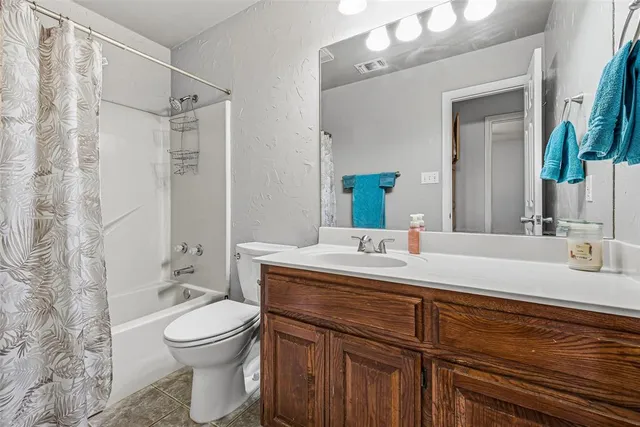 a view of a storage room with furniture