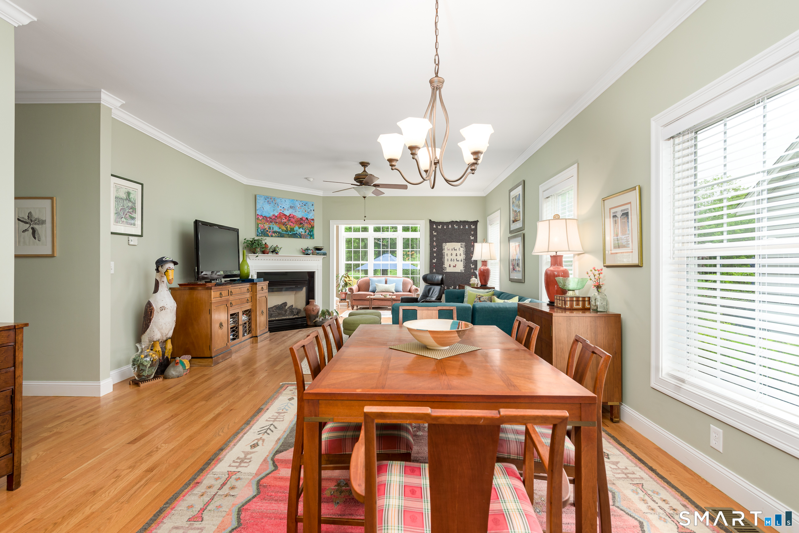 8 Greendale Drive, Unit 8 Suffield, CT 06078 - Photo 18 of 40 a view of a dining room with furniture window and wooden floor