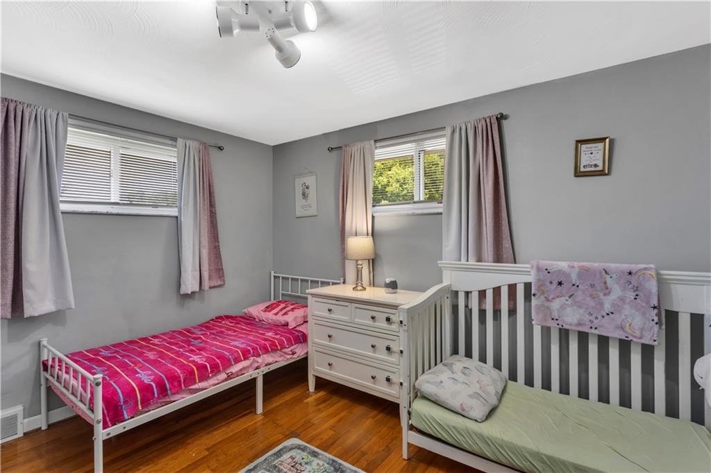 391 Wendel Road Irwin, PA 15642 - Photo 14 of 32 a bedroom with a bed and a window