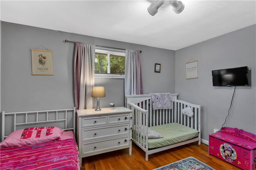 391 Wendel Road Irwin, PA 15642 - Photo 15 of 32 a bedroom with furniture and a window