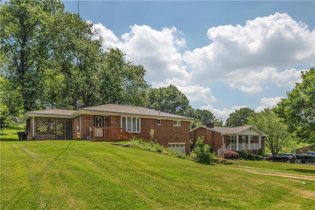 391 Wendel Road Irwin, PA 15642 - Photo 2 of 32 a view of a house with a yard