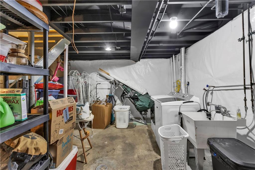 391 Wendel Road Irwin, PA 15642 - Photo 24 of 32 a utility room with lots of wooden furniture