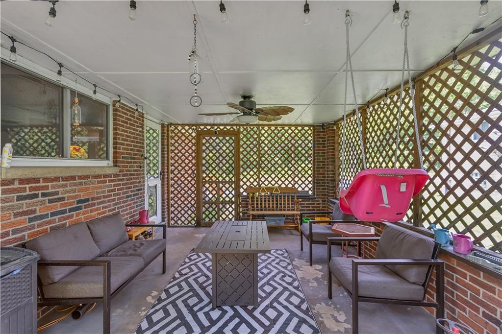 391 Wendel Road Irwin, PA 15642 - Photo 26 of 32 a view of a chairs and table in patio