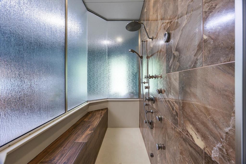 2702 Hidden Trails Road Royse City, TX 75189 - Photo 18 of 39 a bathroom with a bathtub and a shower