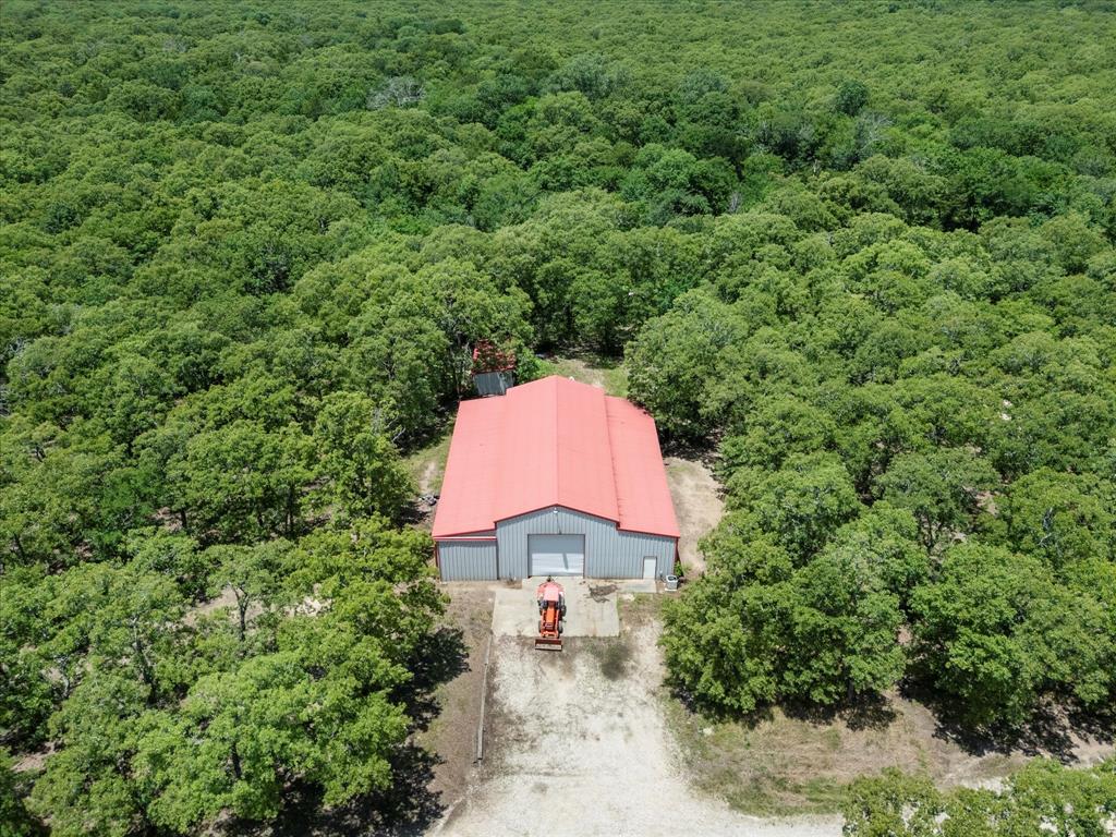 2702 Hidden Trails Road Royse City, TX 75189 - Photo 2 of 39 an aerial view of a house with a yard and outdoor seating