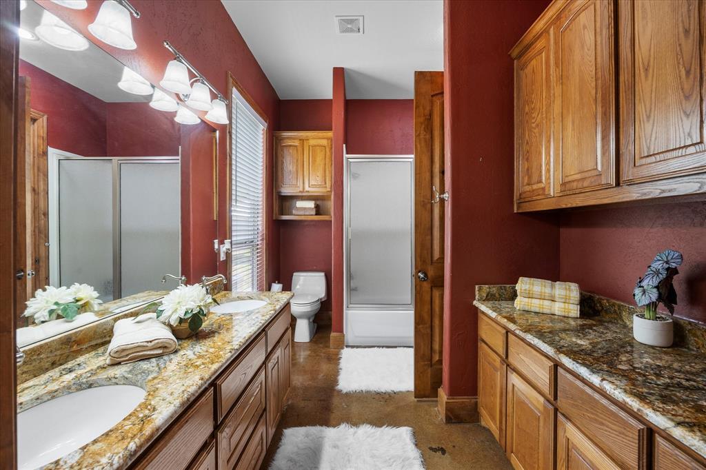 2702 Hidden Trails Road Royse City, TX 75189 - Photo 31 of 39 a kitchen with granite countertop lots of counter top space