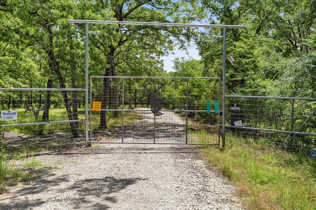 2702 Hidden Trails Road Royse City, TX 75189 - Photo 32 of 39 a view of a yard with a park