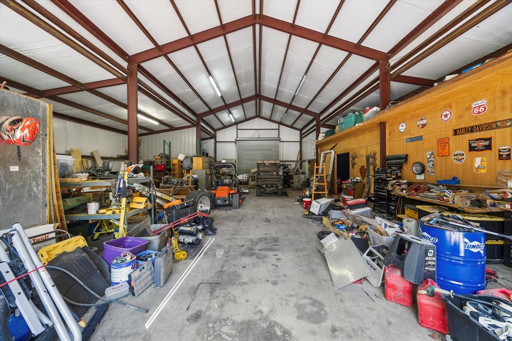 2702 Hidden Trails Road Royse City, TX 75189 - Photo 35 of 39 a view of a room with gym equipment