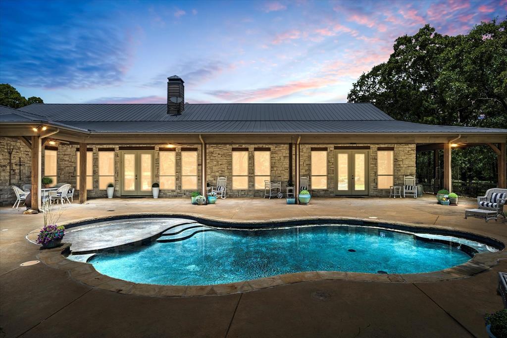 2702 Hidden Trails Road Royse City, TX 75189 - Photo 10 of 39 a view of a house with swimming pool and porch