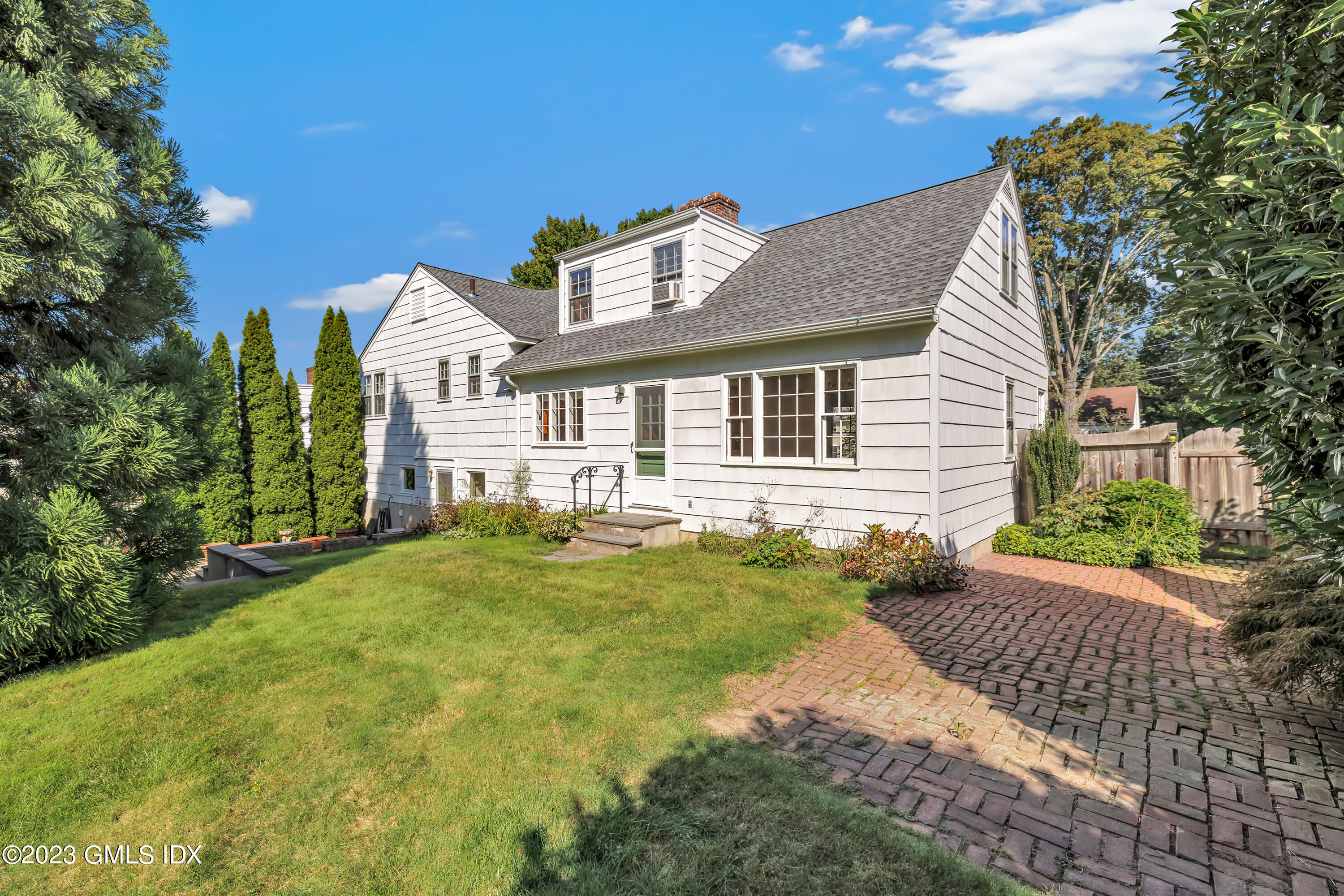 20 Bayside Terrace Riverside, CT 06878 - Photo 29 of 30 a front view of a house with a yard
