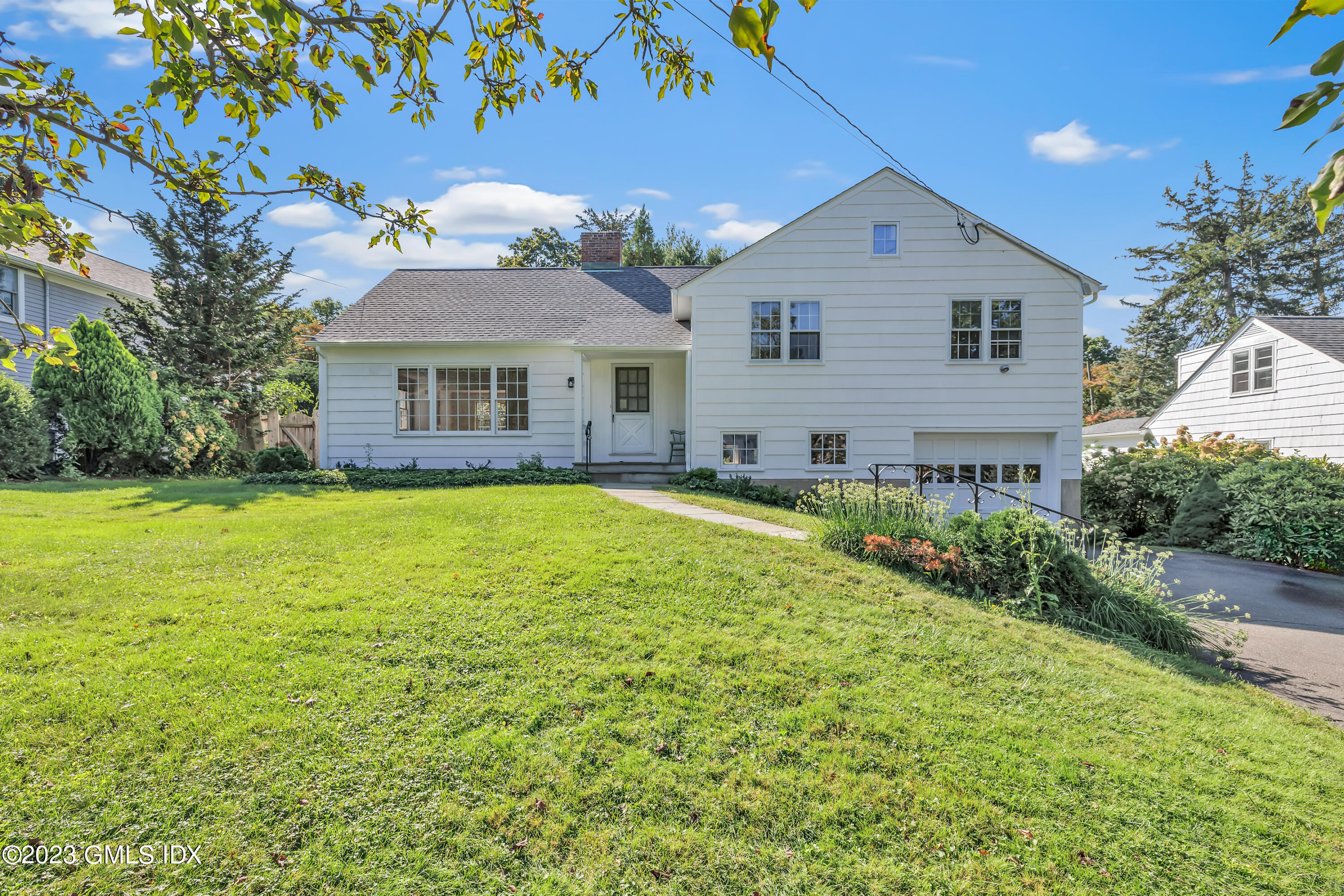 20 Bayside Terrace Riverside, CT 06878 - Photo 30 of 30 a view of a house with a yard