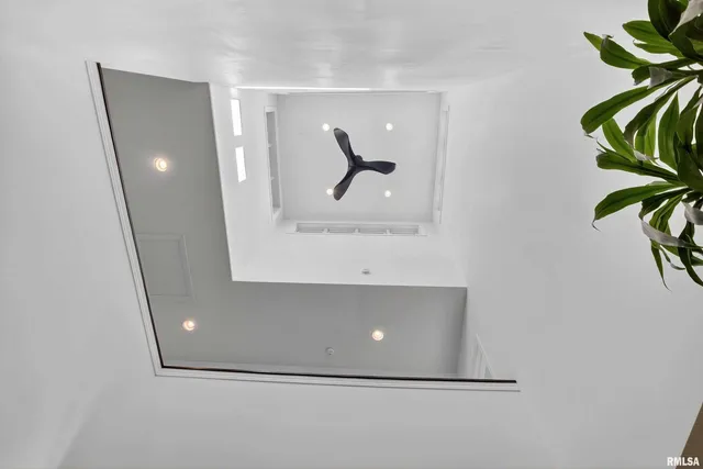 a house view with swimming pool