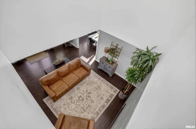 a view of a yard with a house in the background